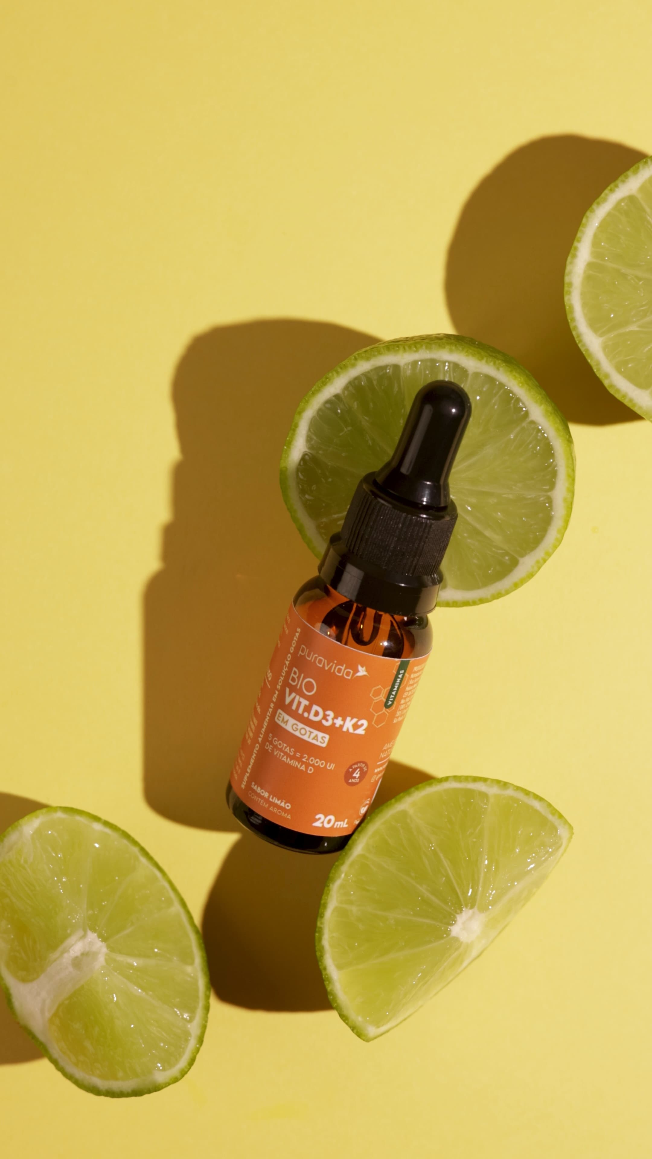 Bio Vit. D3 + K2 em gotas com rodelas de limão